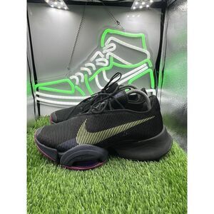 Nike Women’s Black Sneakers with Yellow Swoosh and Purple Accents